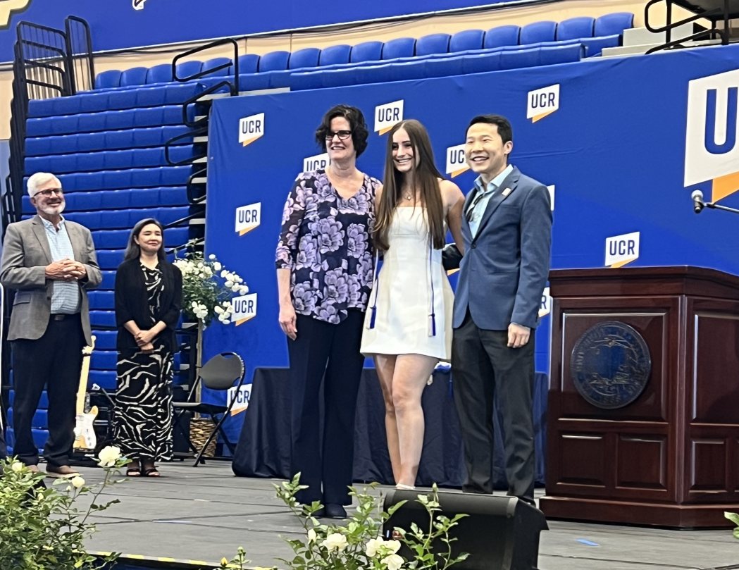 Milena Guidotti receiving her University Honors cord